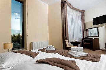 Фото номера Двухместный номер Делюкс с 2 отдельными кроватями Отель Hotel Forum Fitness Spa &amp; Wellness г. Люблин 6