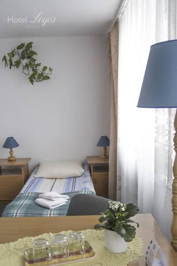 Фото номера Трехместный номер Отель Hotel Logos г. Люблин 7