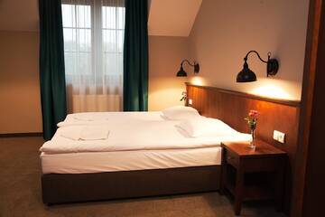 Фото номера Двухместный номер с 2 отдельными кроватями Отель Hotel Biesiada г. Люблин 2