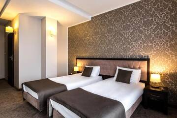 Фото номера Двухместный номер с 2 отдельными кроватями Отель Hotel Focus Centrum Konferencyjne г. Люблин 14