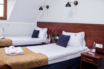 Фото номера Двухместный номер с 2 отдельными кроватями Отель Hotel Trzy Róże г. Люблин 5