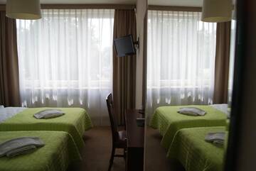 Фото номера Стандартный двухместный номер с 2 отдельными кроватями Отель Hotel PZMot г. Люблин 2