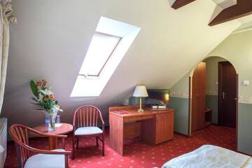 Фото номера Двухместный номер в мансарде с 2 отдельными кроватями Отель Hotel Browar Lwów г. Люблин 3