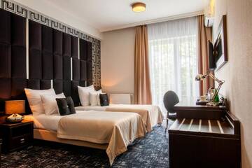 Фото номера Двухместный номер с 2 отдельными кроватями Отель Hotel Luxor г. Люблин 3