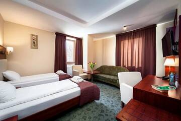 Фото номера Двухместный номер с 2 отдельными кроватями Отель Hotel Młyn г. Люблин 4