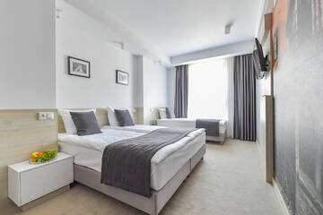 Фото номера Стандартный трехместный номер Отель Lubhotel г. Люблин 3