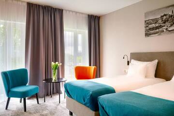 Фото номера Двухместный номер с 2 отдельными кроватями Отель Focus Hotel Premium Lublin г. Люблин 2